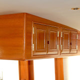 New teak hanging cabinet in 60’ motor yacht.